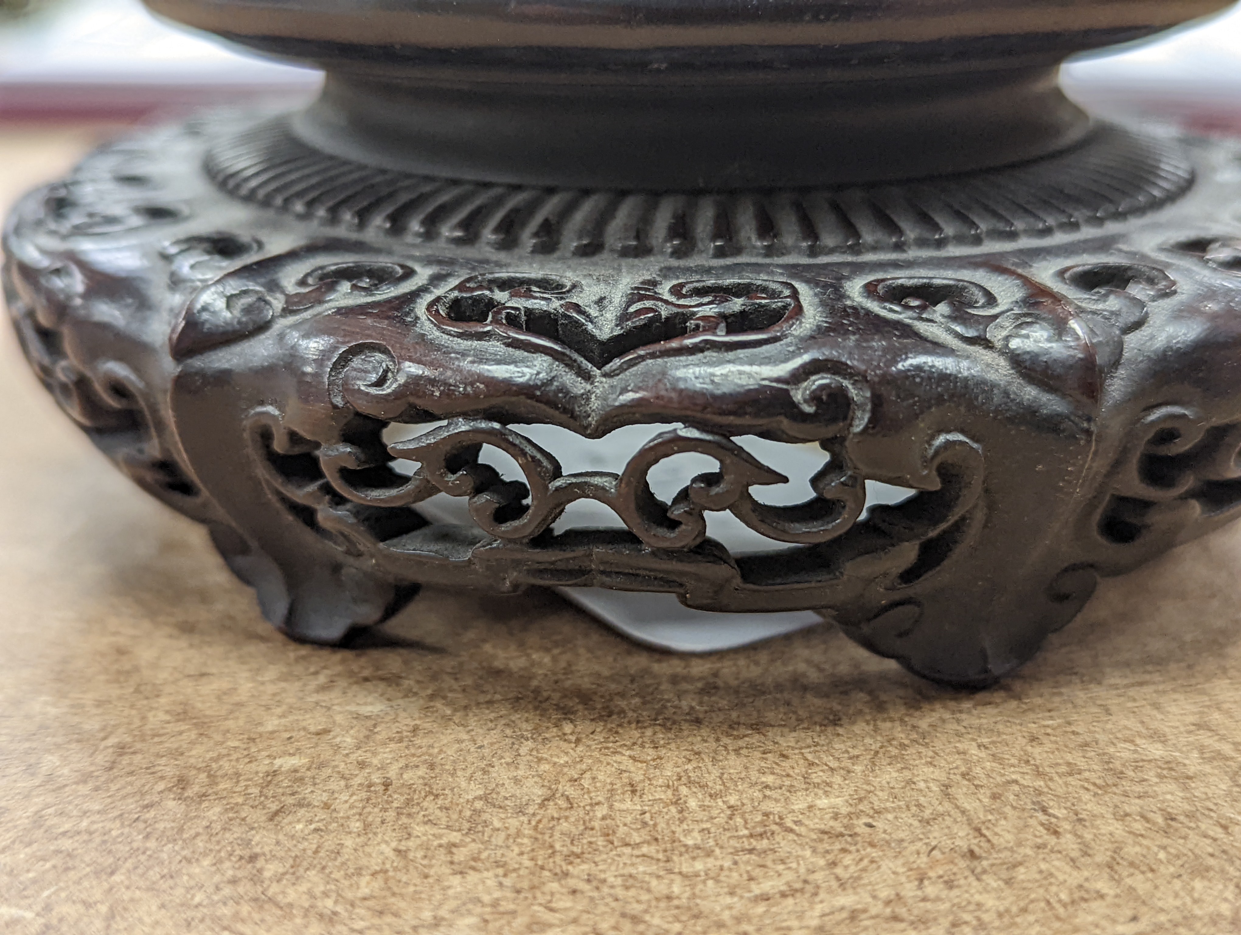 A fine 19th century Chinese hardwood stand, 11.4cm diameter
